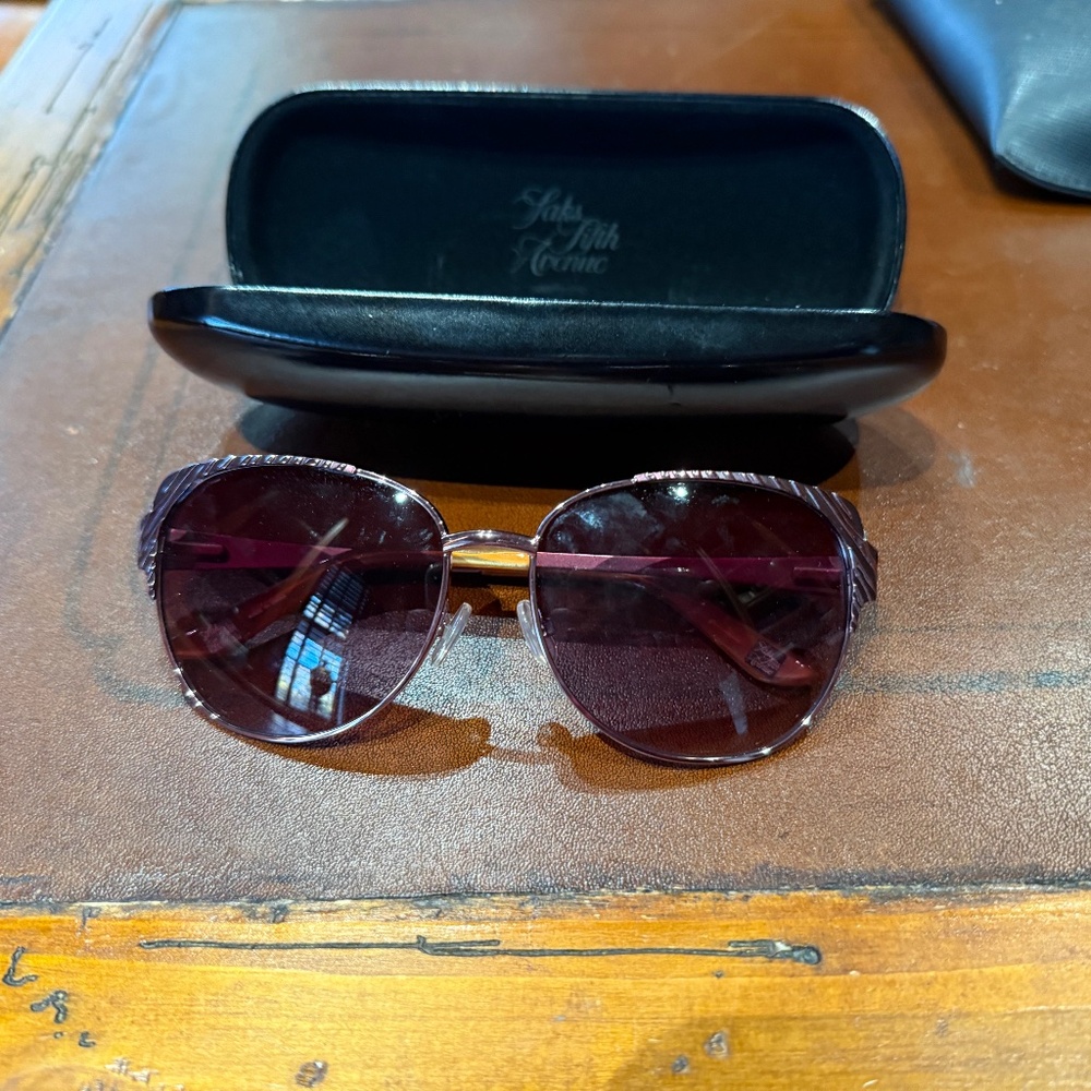 Never worn pair of Saks Fifth Avenue Sunglasses